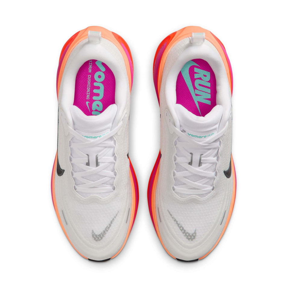 The uppers of a pair of Nike Women's Vomero Plus Road Running Shoes in the White/Black-Fire Pink-Hyper Crimson colourway. (8756160888994)