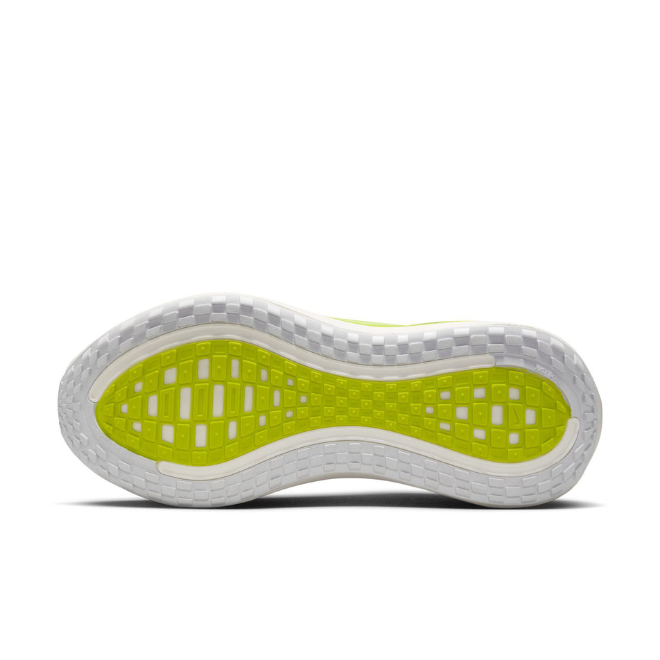 The outsole of the left shoe from a pair of Nike Women's Vomero Plus Road Running Shoes in the White/Black-Cyber-Light Lemon Twist colourway.