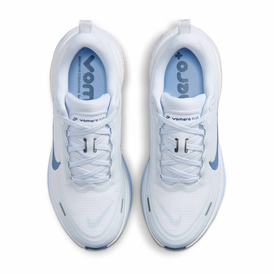 The uppers of a pair of Nike Women's Vomero Plus Road Running Shoes in the White/Mystic Navy-Aluminum-Football Grey colourway.