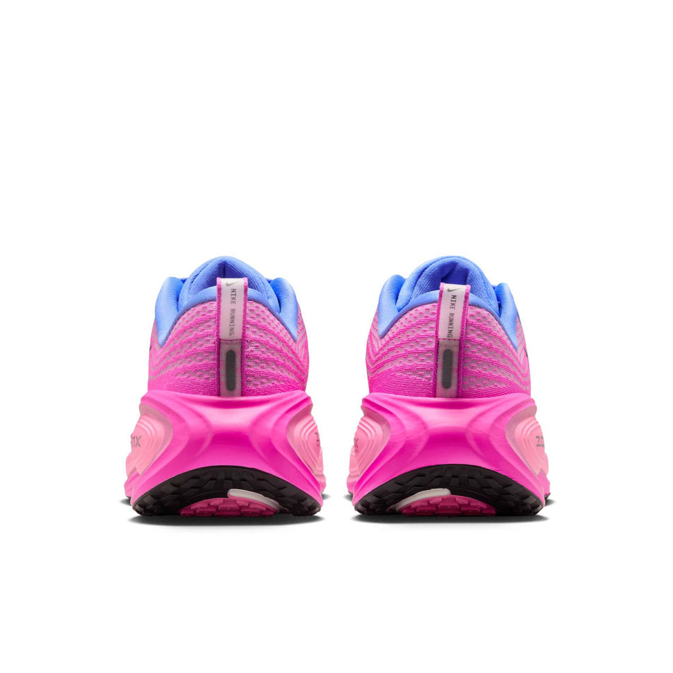 The back of a pair of Nike Women's Vomero Plus Road Running Shoes in the Royal Pulse/Metallic Dark Grey-Fire Pink colourway. (8725329608866)