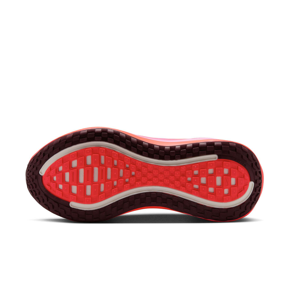 The outsole of the left shoe from a pair of Nike Women's Vomero Plus Road Running Shoes in the Hyper Pink/Burgundy Crush colourway. (8736251773090)