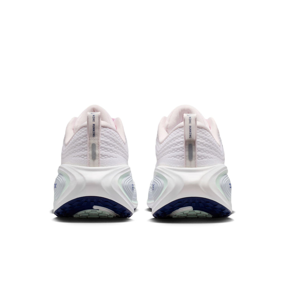 The back of a pair of Nike Women's Vomero Plus Road Running Shoes in the Pearl Pink/Midnight Navy-White colourway.