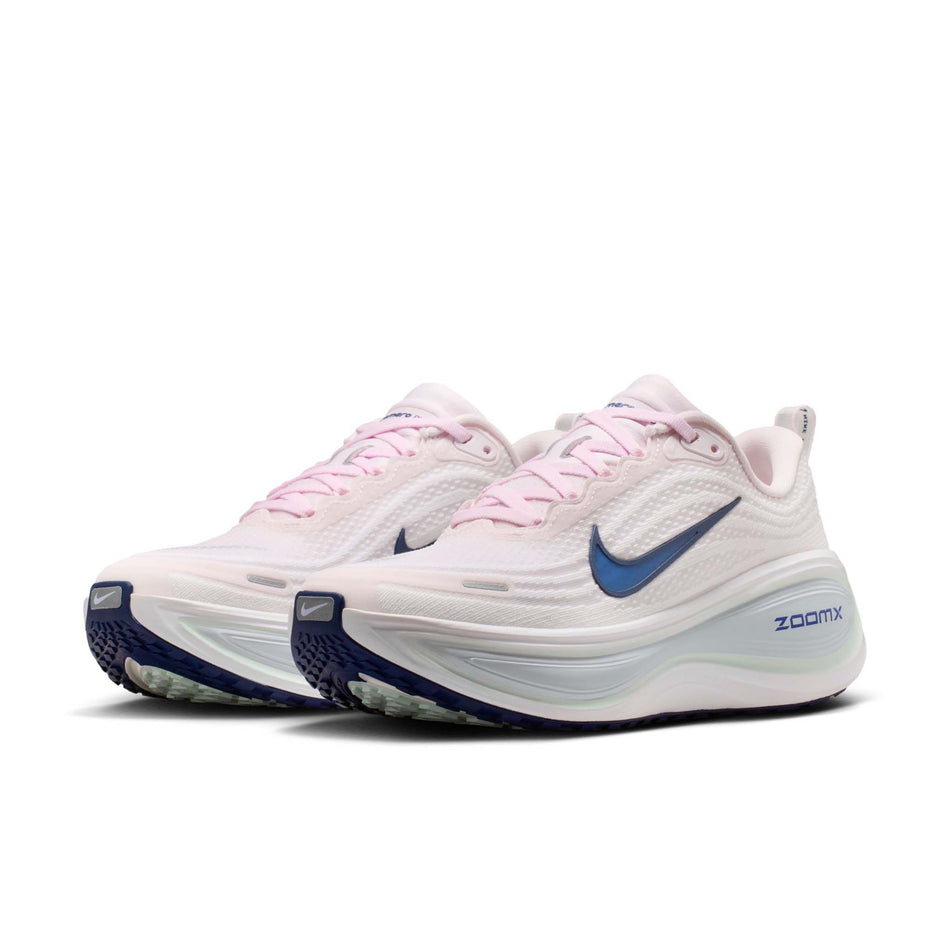 A pair of Nike Women's Vomero Plus Road Running Shoes in the Pearl Pink/Midnight Navy-White colourway.
