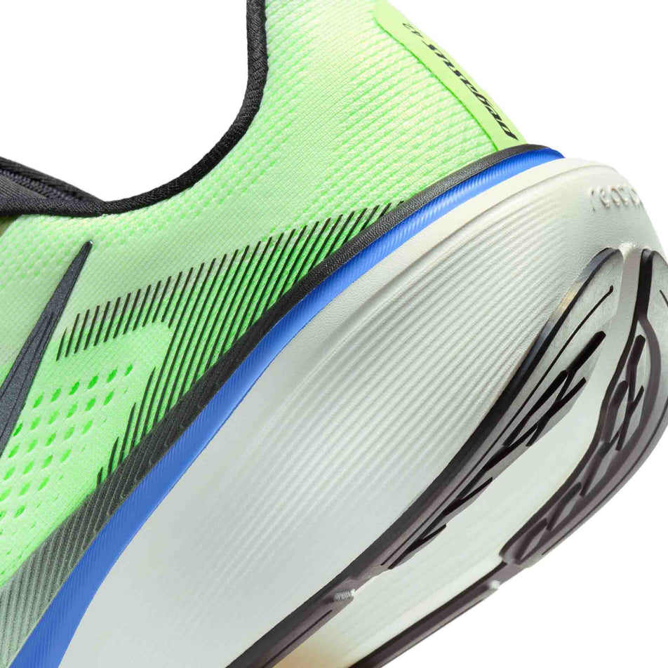 Close-up view of the rearfoot section of the left shoe from a pair of Nike Men's Pegasus 42 Road Running Shoes in the Volt Tint/Black Spruce-Sapphire colourway.