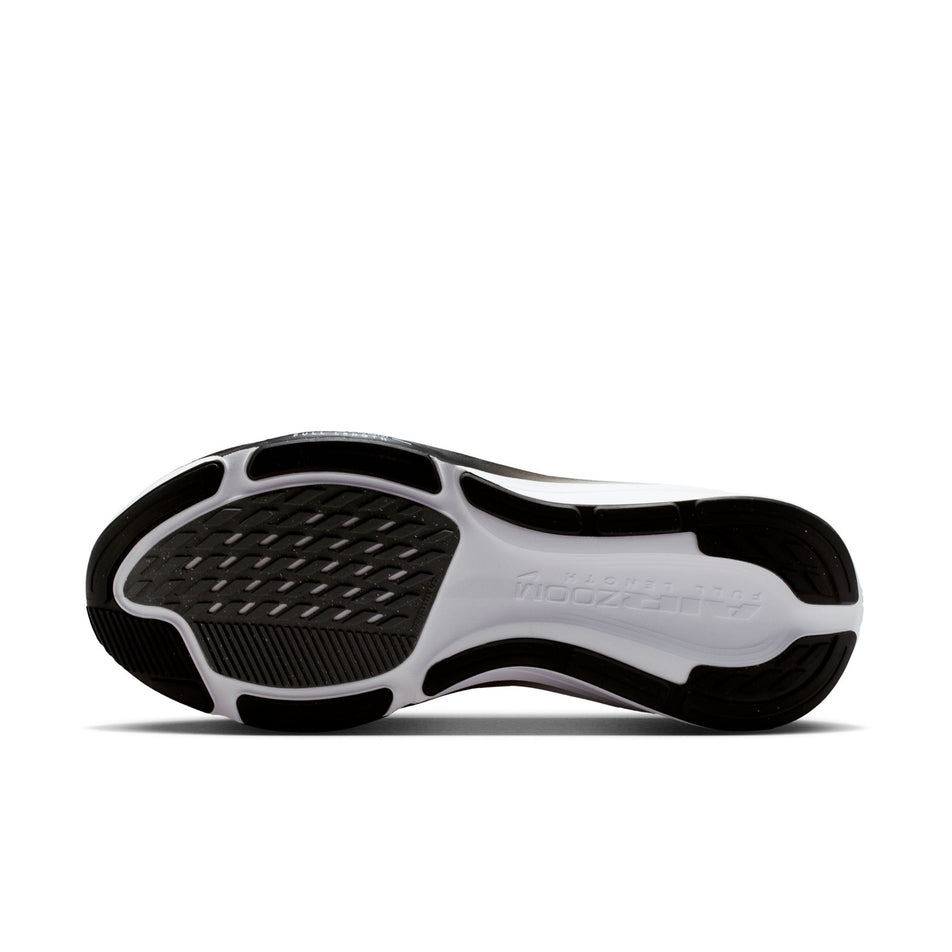 The outsole of the left shoe from a pair of Nike Women's Pegasus 42 Road Running Shoes in the Black/White-Iron Grey colourway.