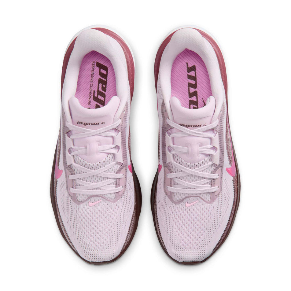 The uppers of a pair of Nike Women's Pegasus 42 Road Running Shoes in the Bleached Lilac/Pink Rise-Mystic Dates colourway.