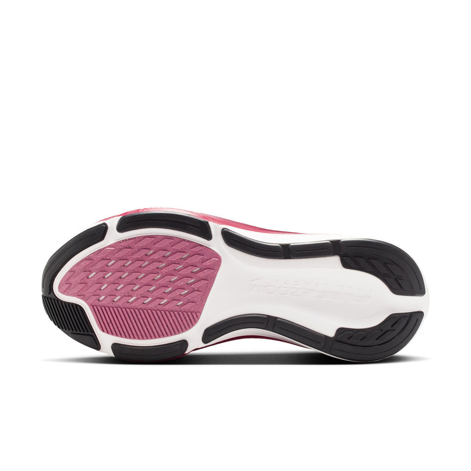The outsole of the left shoe from a pair of Nike Women's Pegasus 42 Road Running Shoes in the Pearl Pink/Black-Peony-Team Crimson colourway.