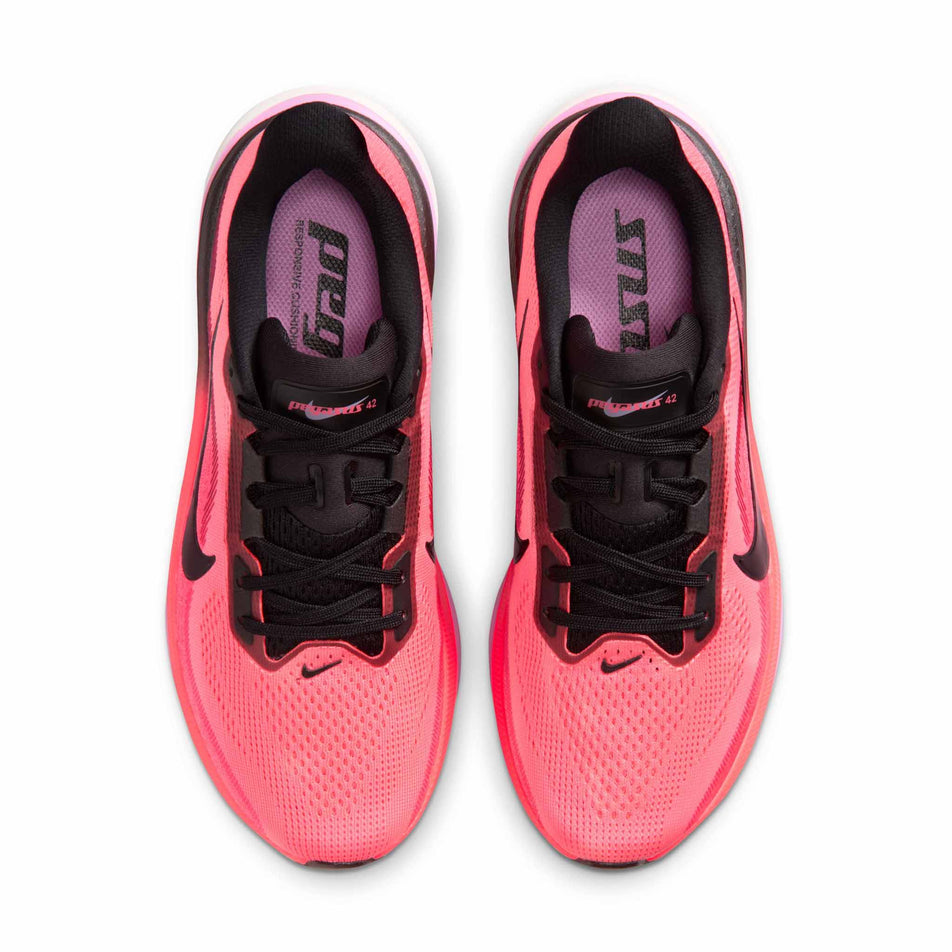 The uppers of a pair of Nike Women's Pegasus 42 Road Running Shoes in the Lava Glow/Black-Flash Crimson-Light Magenta colourway.