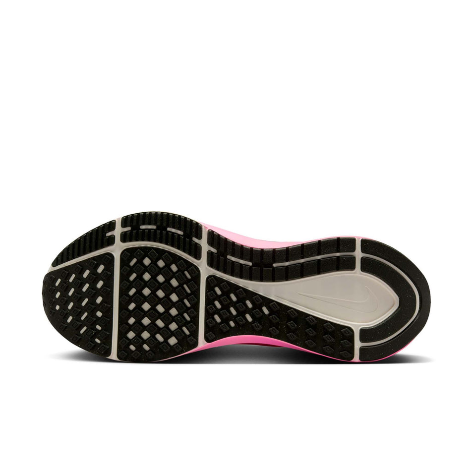 The outsole of the left shoe from a pair of Nike Men's Structure 25 Road Running Shoes in the Sail/Sequoia-Hyper Pink-Bright Crimson colourway. (8614517276834)
