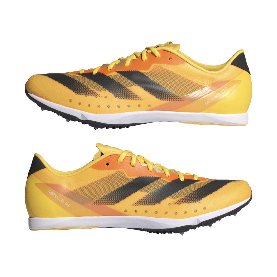 A pair of adidas Unisex Distancestar Track Spikes in the spark/Core black/zero met. colourway (8404502937762)