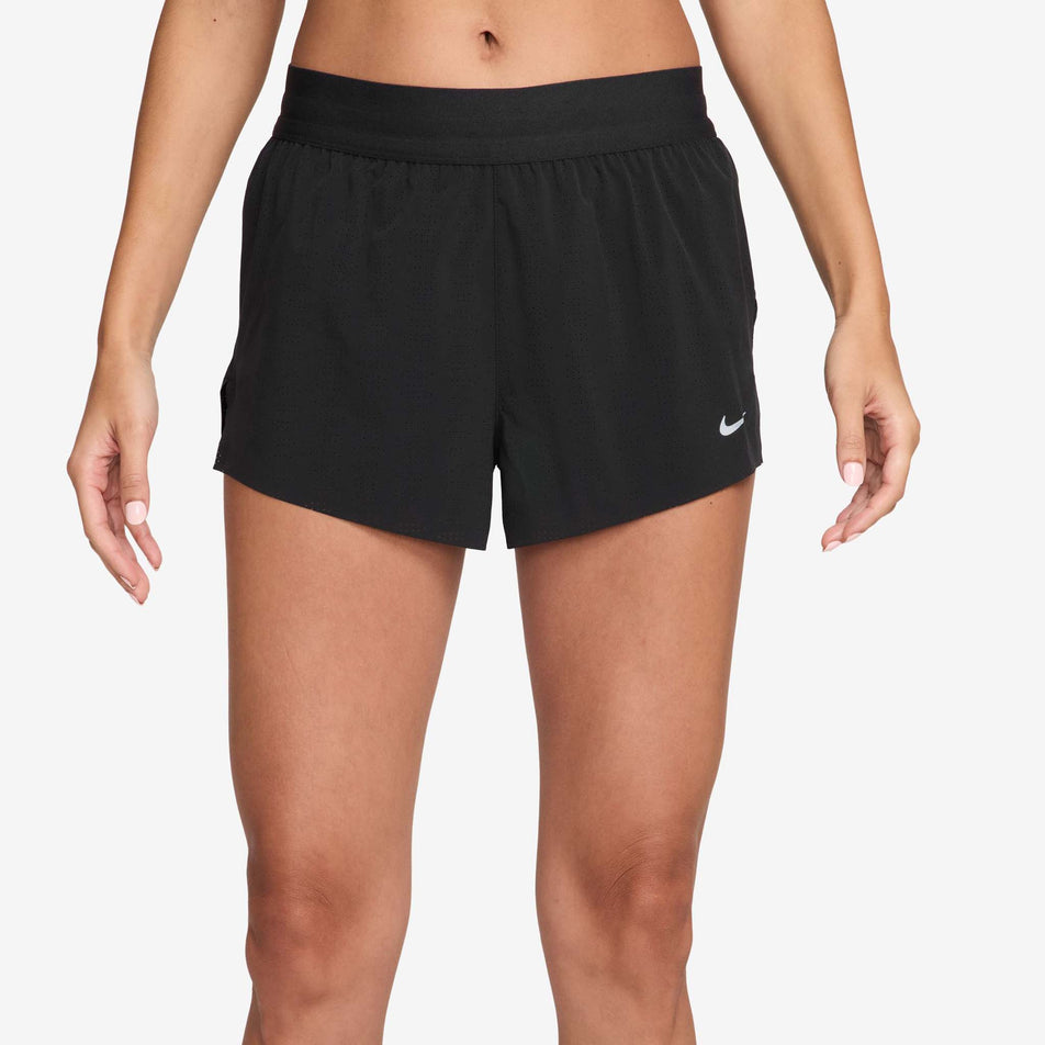 Front view of a model wearing the Nike Women's Swift Breathe Dri-FIT Mid-Rise 2.5