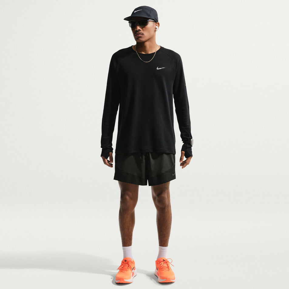 Front view of a model wearing the Nike Men's Stride Plus Dri-FIT 5