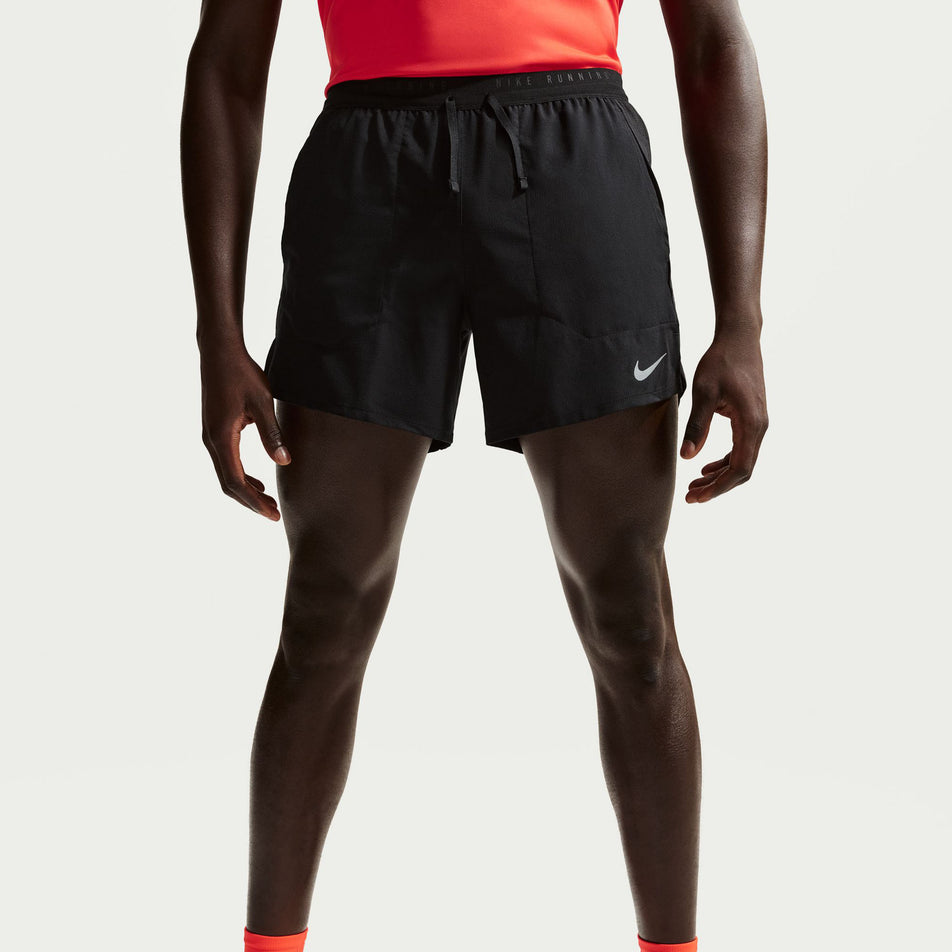 Front view of a model wearing the Nike Men's Stride Dri-FIT 5