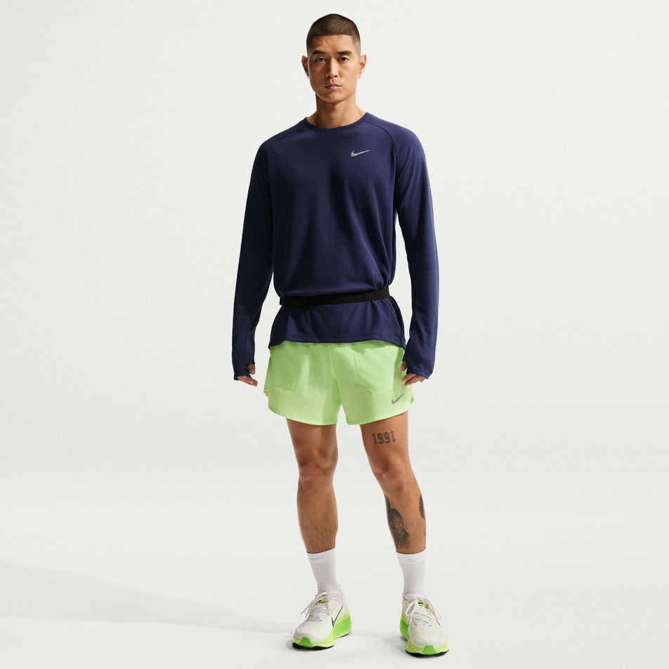 Front view of a model wearing the Nike Men's Stride Dri-FIT 5