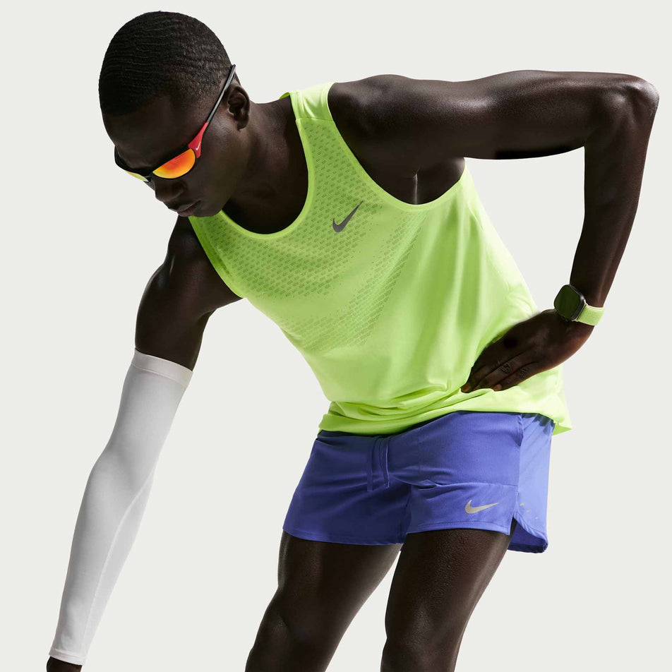 Angled view of a model wearing the Nike Men's Stride Dri-FIT 5