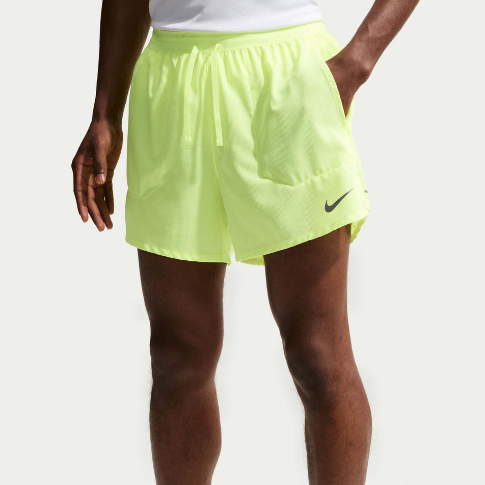Front view of a model wearing the Nike Men's Stride Dri-FIT 5