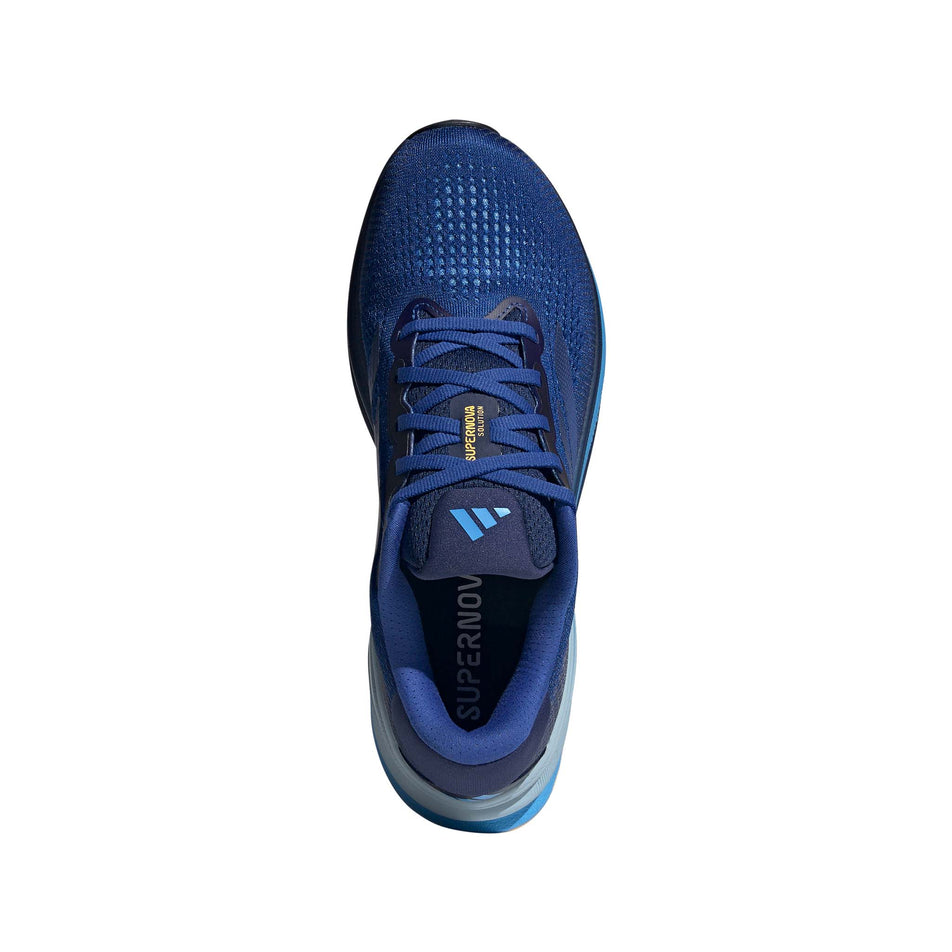 The upper on the right shoe from a pair of adidas Men's Supernova Solution Running Shoes in the Team Royal Blue/Dark Blue/Blue Burst colourway (8192144146594)