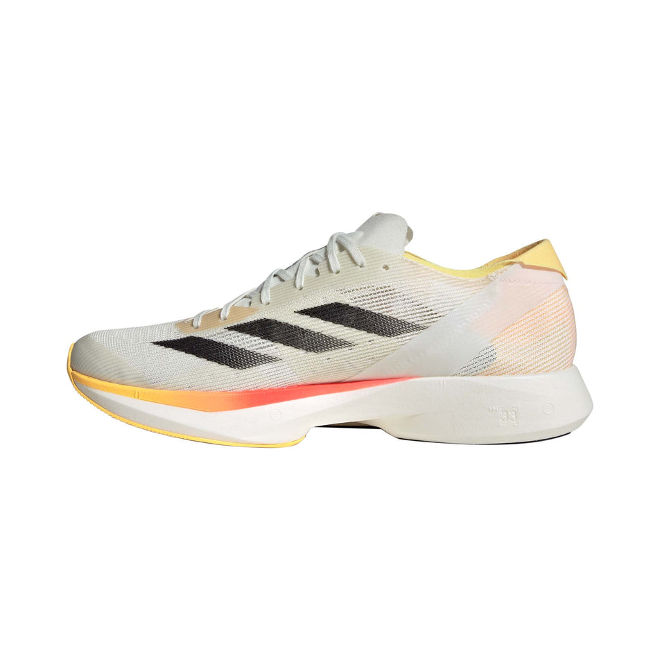 Medial side of the right shoe from a pair of adidas Men's Takumi Sen 10 Running Shoes in the Ivory/Core Black/Off White Colourway (8193603174562)