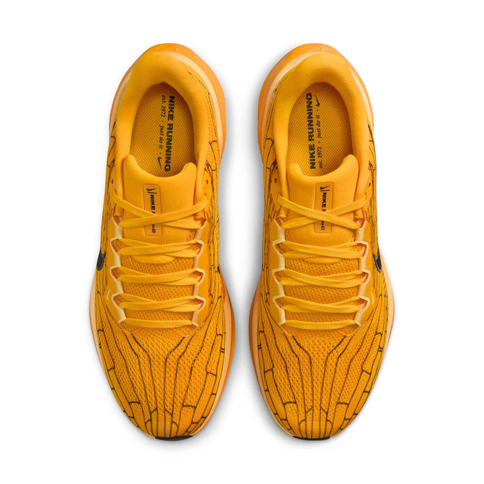 The uppers of a pair of Nike Men's Pegasus 41 LV8 Road Running Shoes in the University Gold/Black-Soft Yellow colourway. (8712397717666)