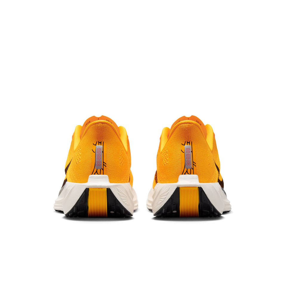 The back of a pair of Nike Men's Pegasus Plus LV8 Road Running Shoes in the University Gold/Black-Laser Orange Sail colourway. (8684355584162)