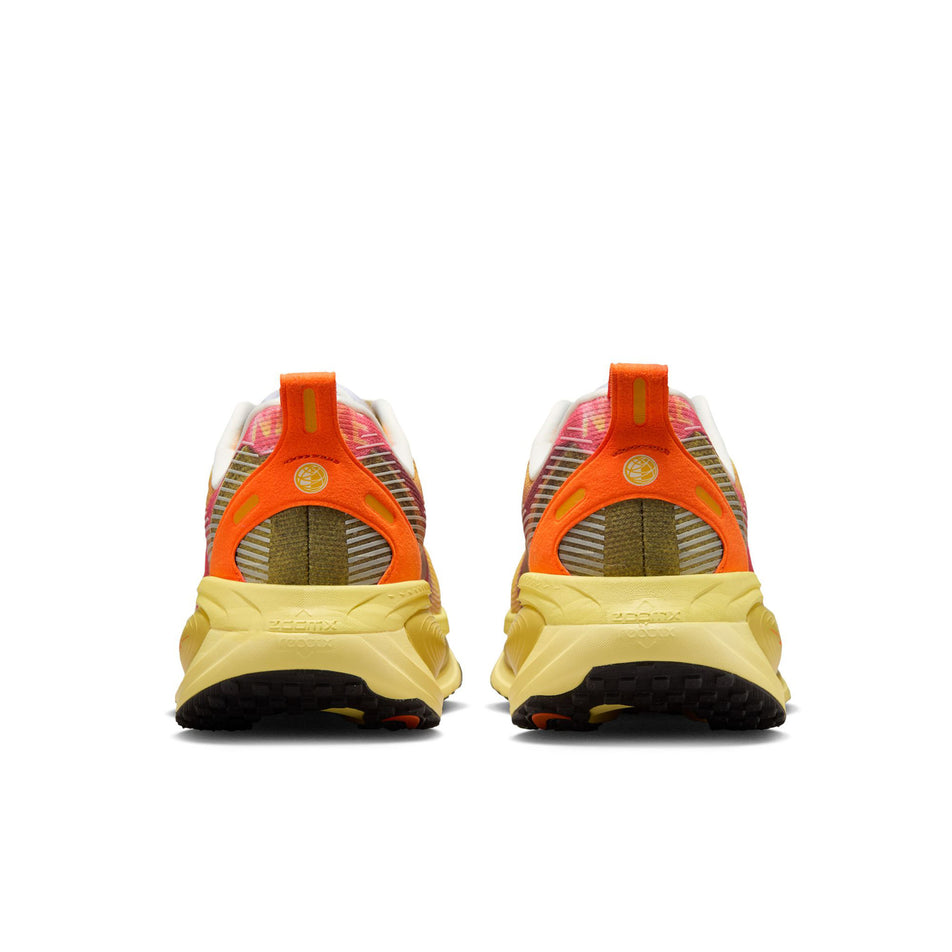 The back of a pair of Nike Men's Vomero 18 SE Road Running Shoes in the Multi-Color/Clear-Vivid Sulfur colourway.(8724270743714)