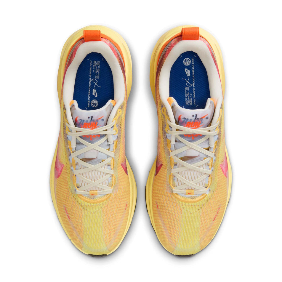 The uppers of a pair of Nike Men's Vomero 18 SE Road Running Shoes in the Multi-Color/Clear-Vivid Sulfur colourway. (8724270743714)