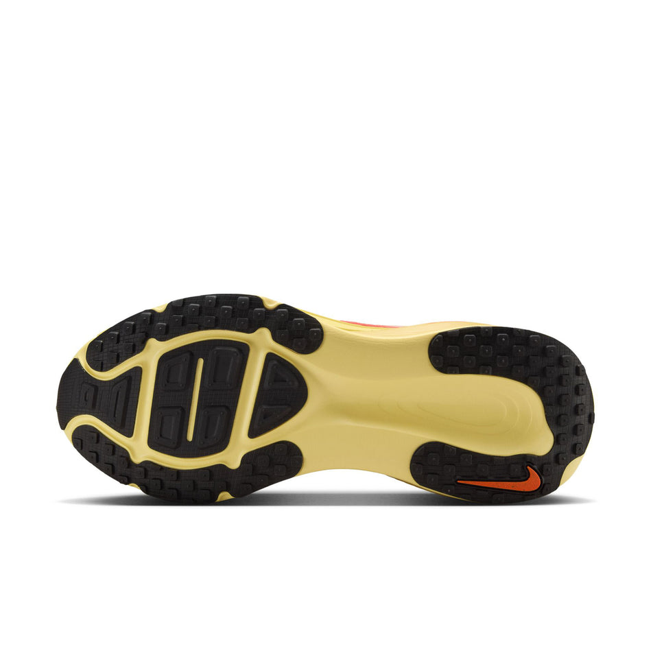 The outsole of the left shoe from a pair of Nike Men's Vomero 18 SE Road Running Shoes in the Multi-Color/Clear-Vivid Sulfur colourway. (8724270743714)