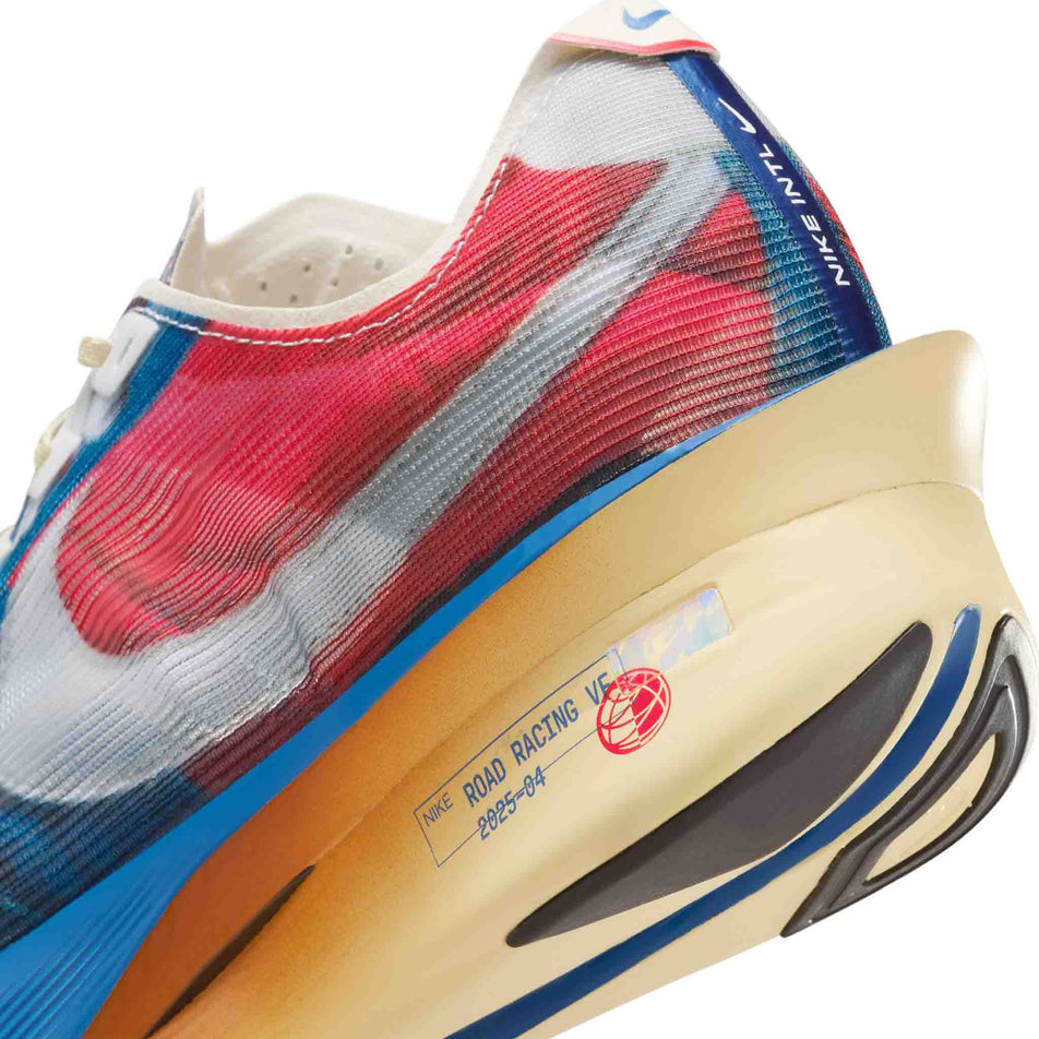Close-up view of the lateral side of the left shoe from a pair of Nike Men's Vaporfly 4 Premium Road Racing Shoes in the Multi-Color/Clear-Mountain Blue-Fire Red colourway. (8723630260386)