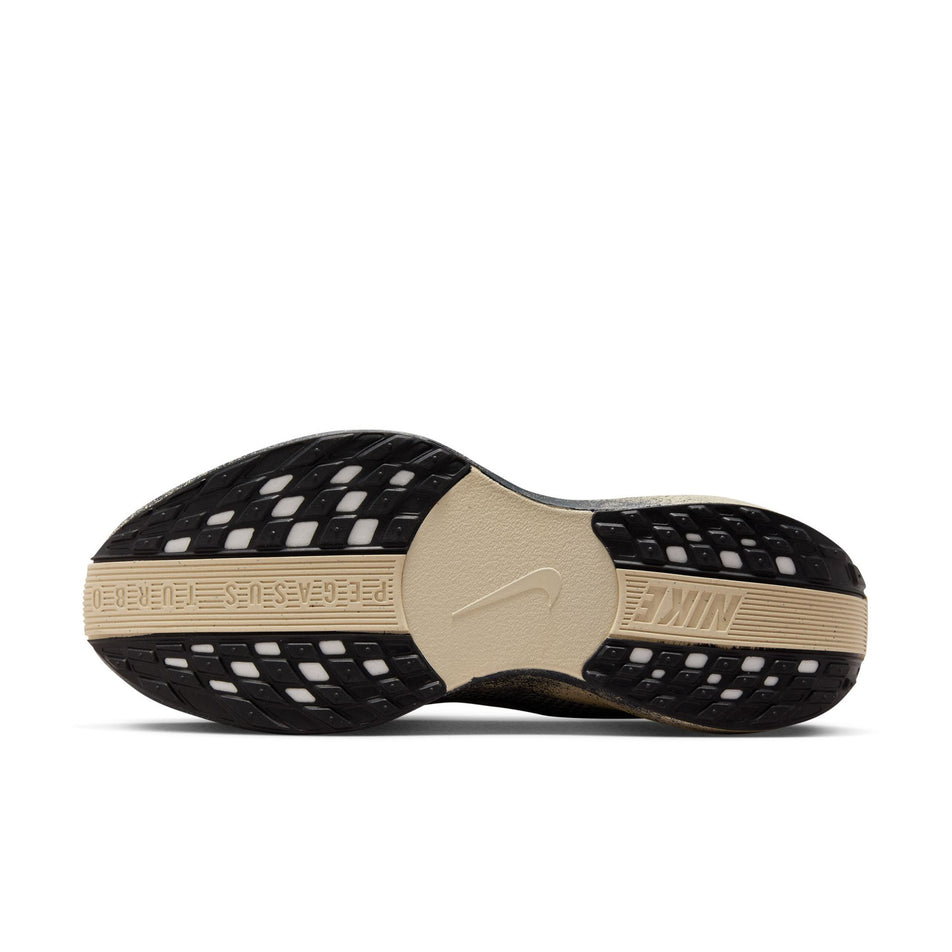 The outsole of the left shoes from a pair of Nike Men's Pegasus Plus Road Running Shoes in the Oatmeal/Black-Anthracite-Volt colourway. (8683765563554)