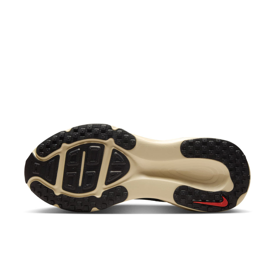 The outsole of the left shoe from a pair of Nike Men's Vomero 18 Road Running Shoes in the Oatmeal/Black-Anthracite-Volt colourway. (8684581552290)