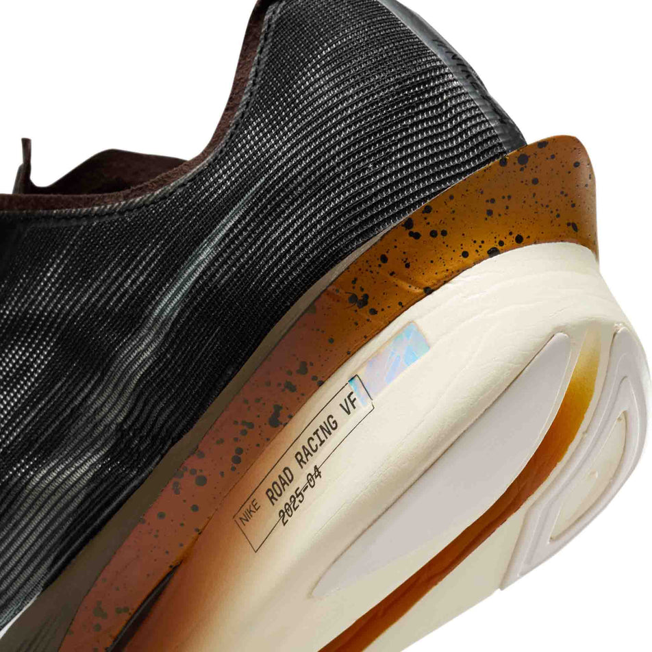 Close-up view of the lateral side of the left shoe from a pair of Nike Men's Vaporfly 4 Road Racing Shoes in the Velvet Brown/Soft Pearl-Black colourway. (8723634094242)