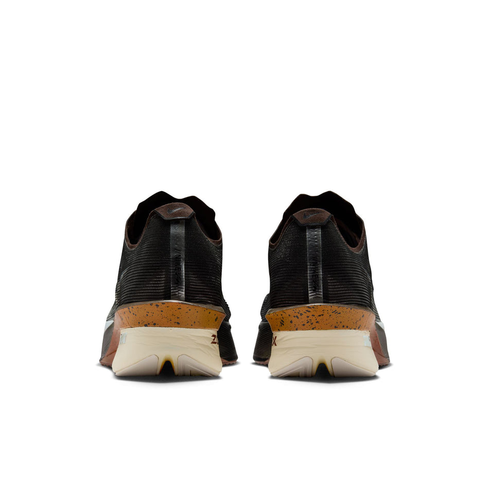 The back of a pair of Nike Men's Vaporfly 4 Road Racing Shoes in the Velvet Brown/Soft Pearl-Black colourway. (8723634094242)