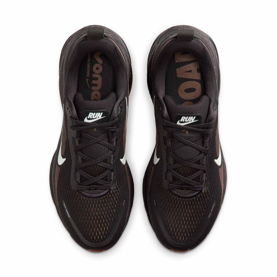 The uppers of a pair of Nike Men's Vomero 18 Road Running Shoes in the Black/Ironstone-Velvet Brown colourway. (8724276379810)