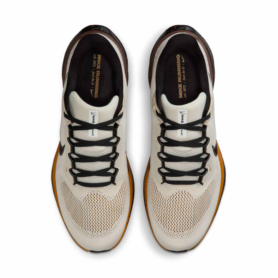 The uppers of a pair of Nike Men's Pegasus 41 Road Running Shoes in the Soft Pearl/Velvet Brown-Desert Ochre colourway. (8724604125346)