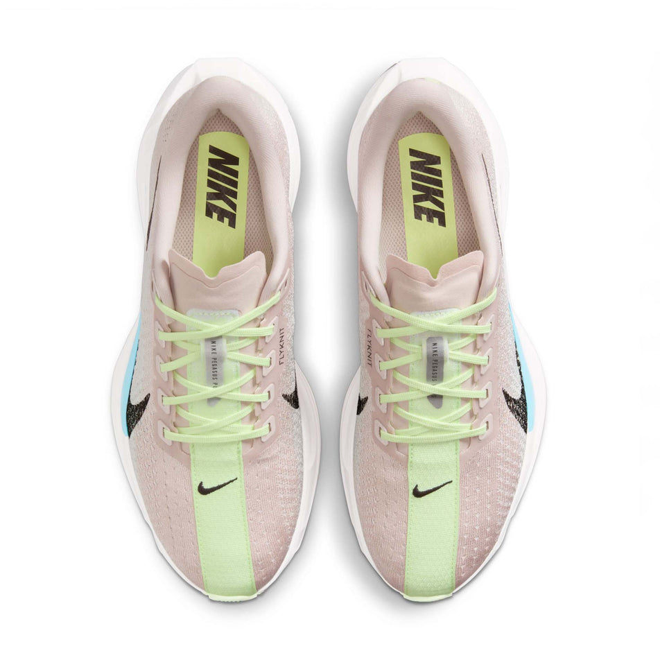 The uppers of a pair of Nike Women's Pegasus Plus Road Running Shoes in the Silt Red/Black-Barely Volt-Platinum Tint colourway. (8724641415330)