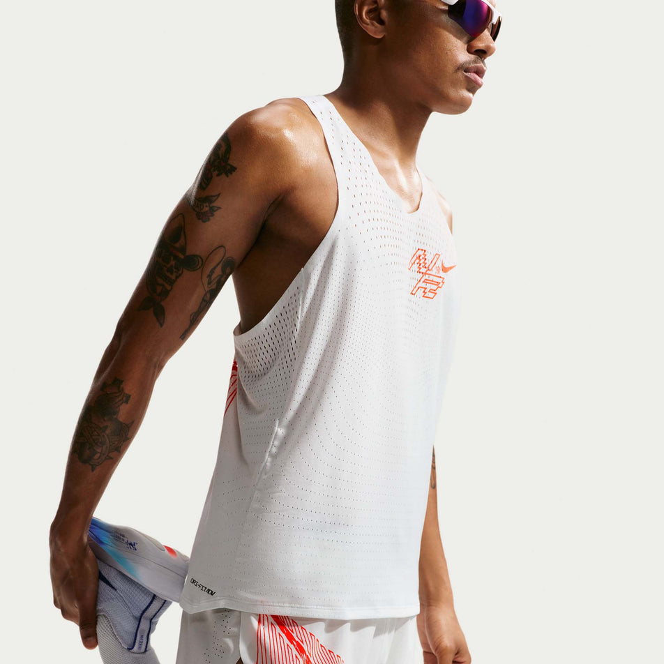 Angled view of a model wearing the Nike Men's AeroSwift Dri-FIT ADV 2
