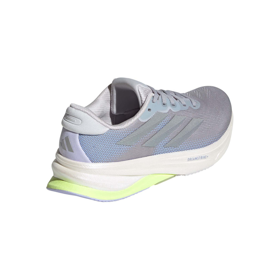 Lateral view of the right shoe from a pair of adidas Women's Supernova Solution 2 Running Shoes in the Halo Silver/Silver Met./Violet Tone colourway. (8635083751586)