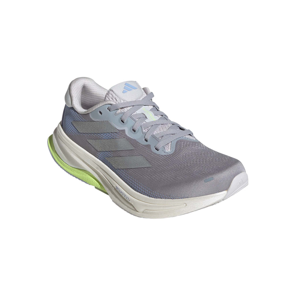 Lateral view of the right shoe from a pair of adidas Women's Supernova Solution 2 Running Shoes in the Halo Silver/Silver Met./Violet Tone colourway. (8635083751586)