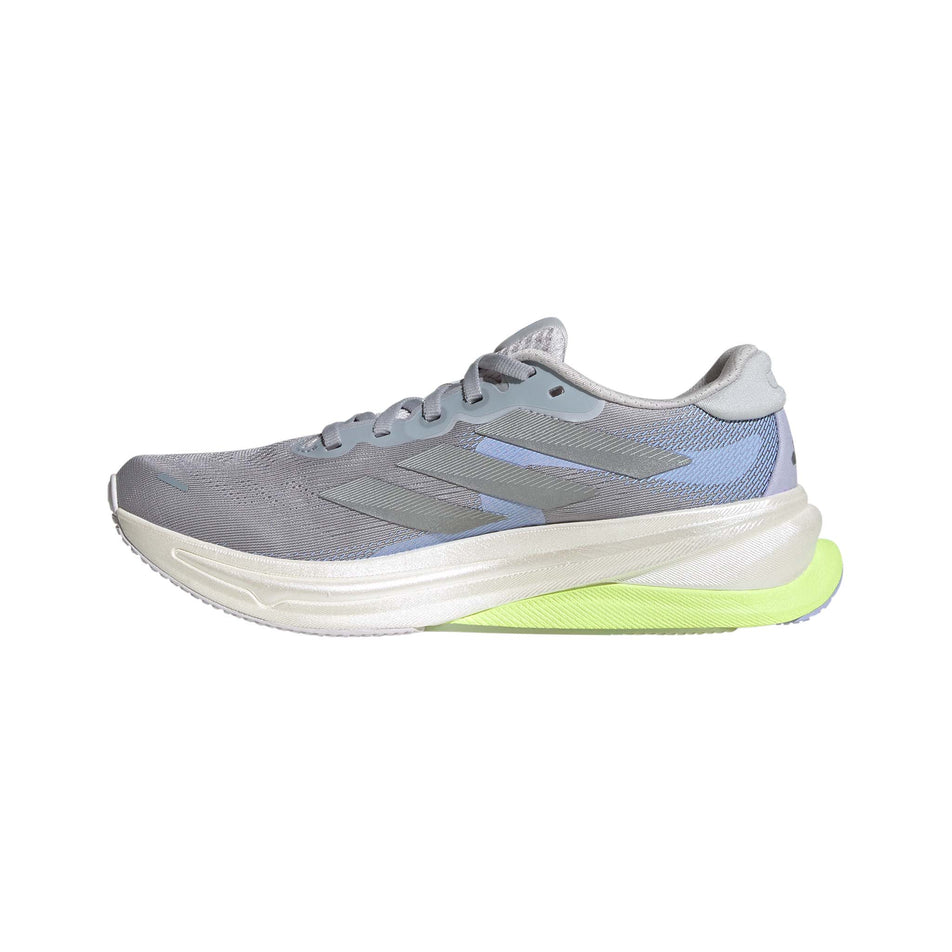 Medial view of the right shoe from a pair of adidas Women's Supernova Solution 2 Running Shoes in the Halo Silver/Silver Met./Violet Tone colourway. (8635083751586)