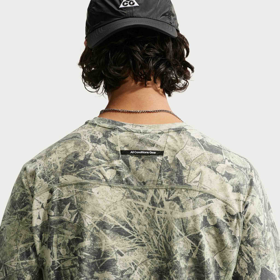 Back view of a model wearing the Nike Men's ACG Solar Chase
