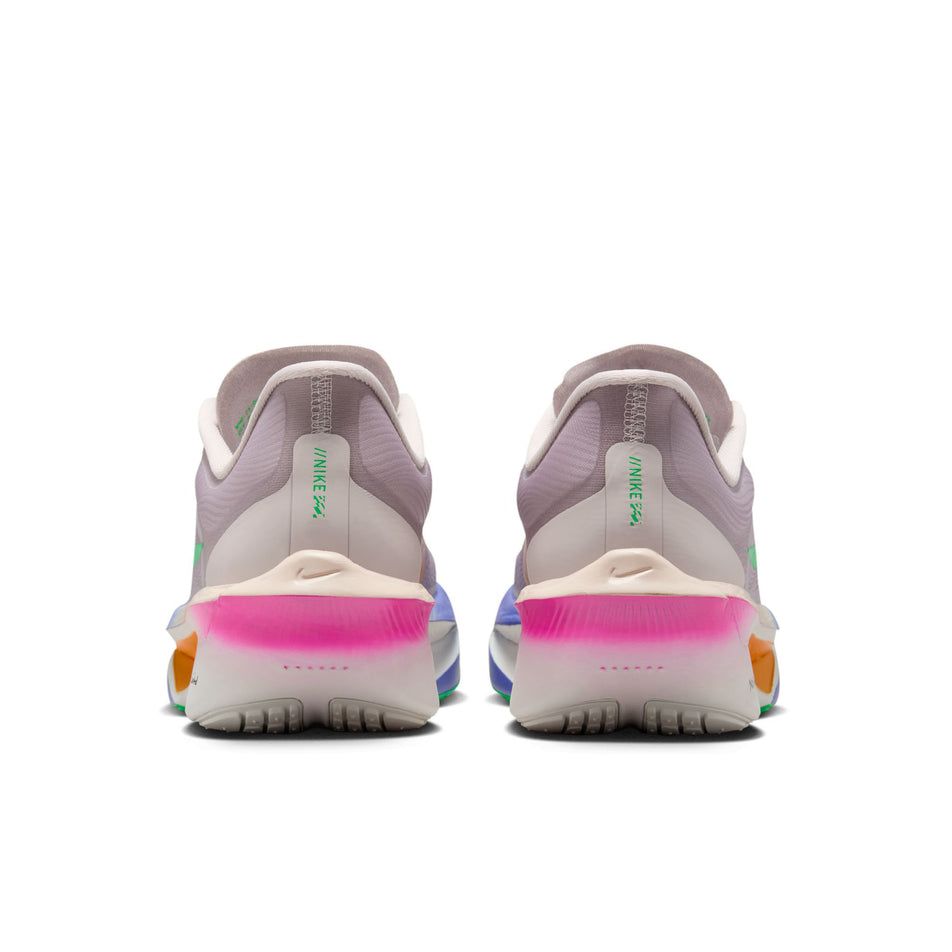 The back of a pair of Nike Women's Zoom Fly 6 Road Running Shoes in the Silt Red/Green Shock-Persian Violet colourway.
