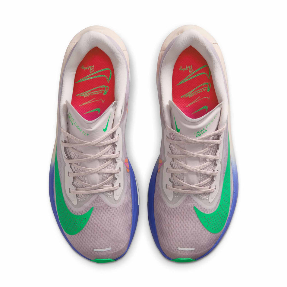 The uppers of a pair of Nike Women's Zoom Fly 6 Road Running Shoes in the Silt Red/Green Shock-Persian Violet colourway.