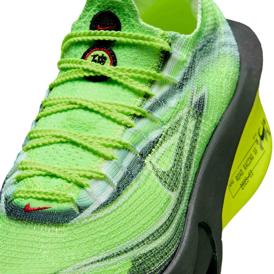 Close-up view of the upper of the left shoe from a pair of Nike Men's Alphafly 3 Road Racing Shoes in the Multi-Color/Black-Volt-White colourway. (8783793062050)