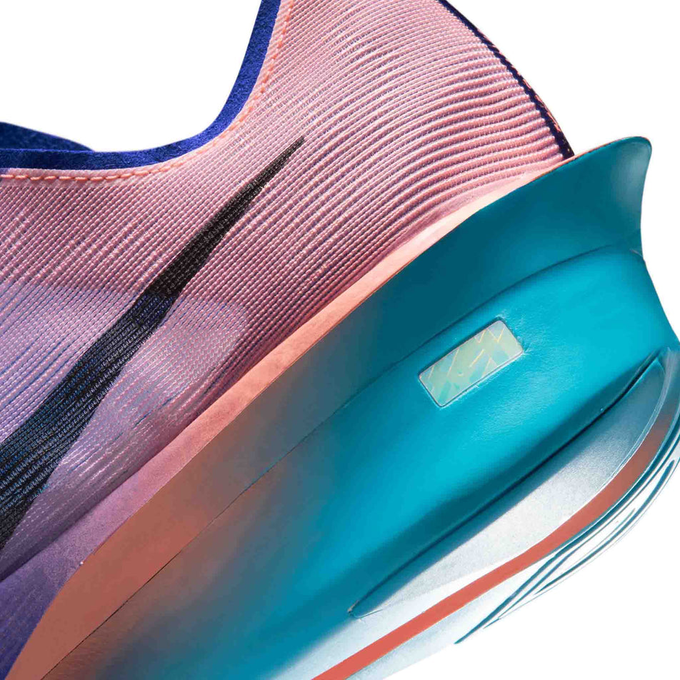 Close-up view of the rearfoot section of the left shoe from a pair of Nike Men's Vaporfly 4 Road Racing Shoes in the Racer Blue/White-Blue Lightning colourway.