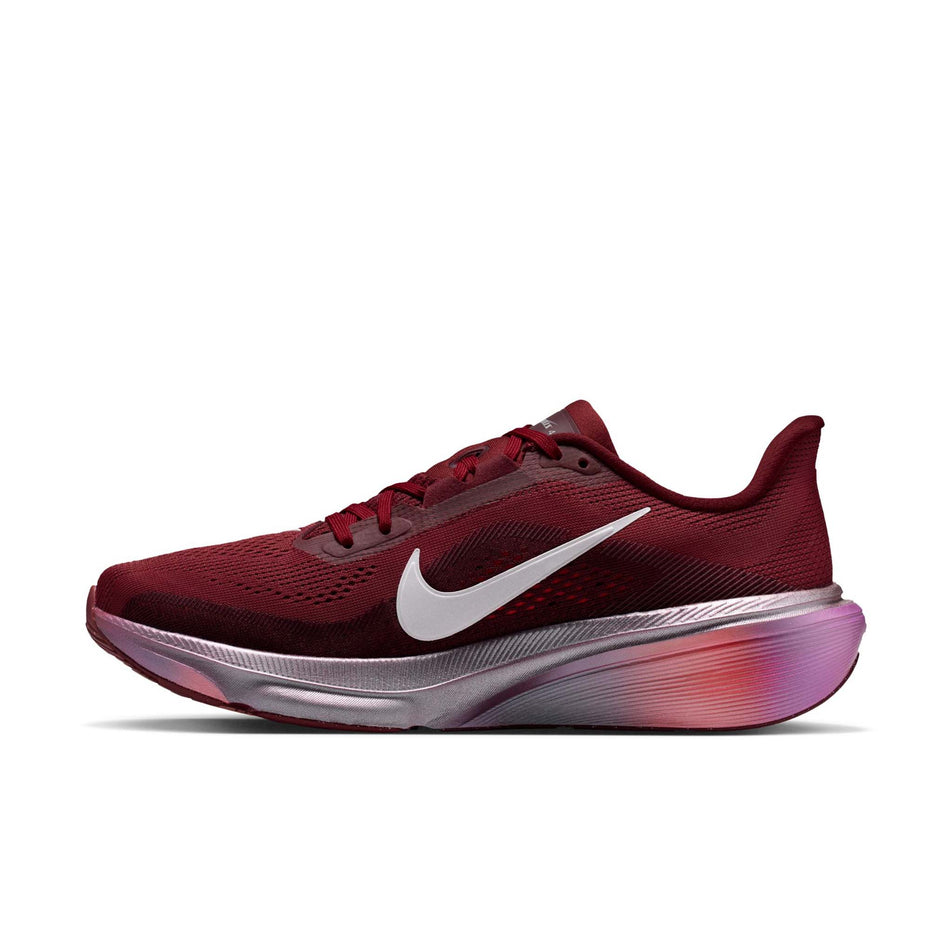 Medial view of the right shoe from a pair of Nike Women's Pegasus 42 SE Road Running Shoes in the Team Red/Barely Green-Atomic Pink colourway.