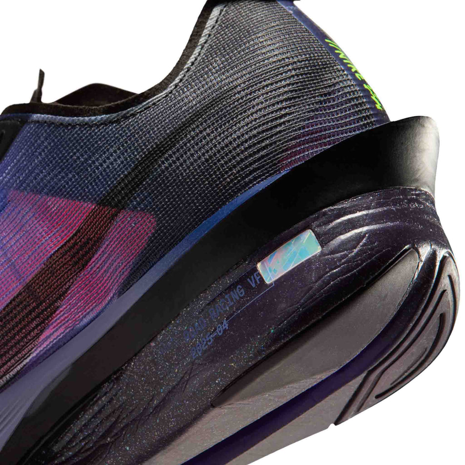 Close-up view of the rearfoot section of the left shoe from a pair of Nike Women's Vaporfly 4 Road Racing Shoes in the Dark Obsidian/Black-Purple Dynasty colourway.
