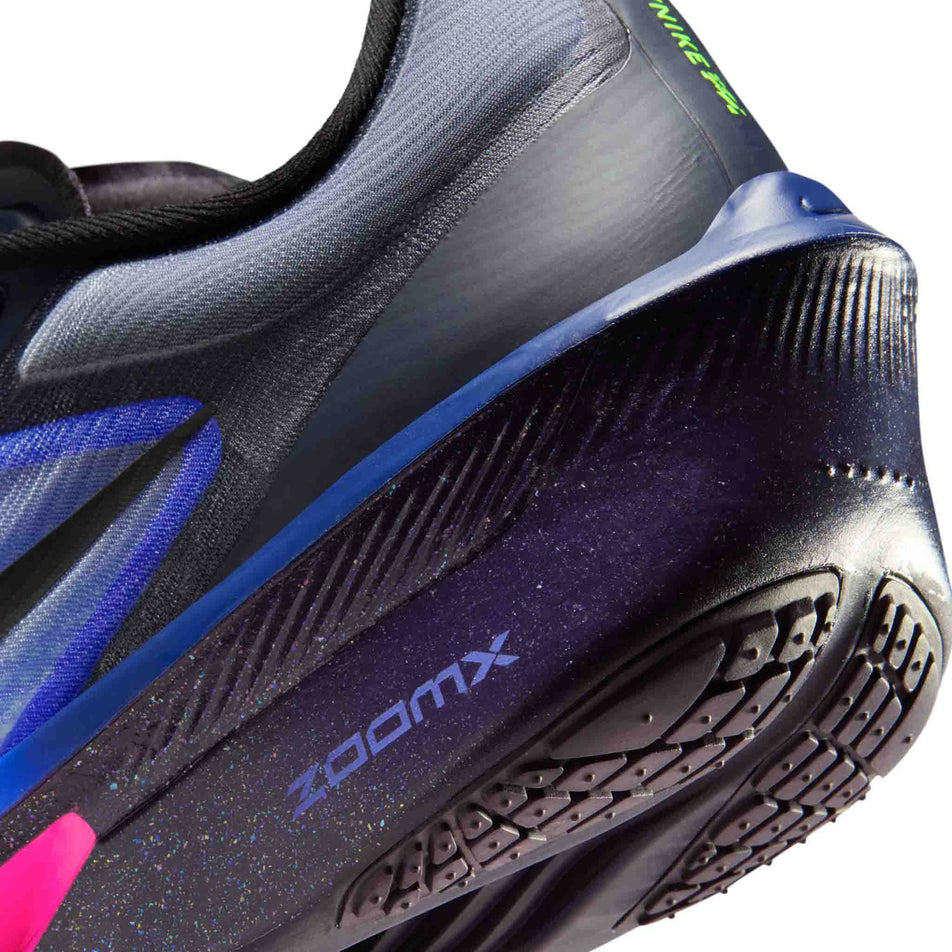 Close-up view of the rearfoot section of the left shoe from a pair of Nike Women's Zoom Fly 6 Road Running Shoes in the Dark Obsidian/Black-Racer Blue colourway.