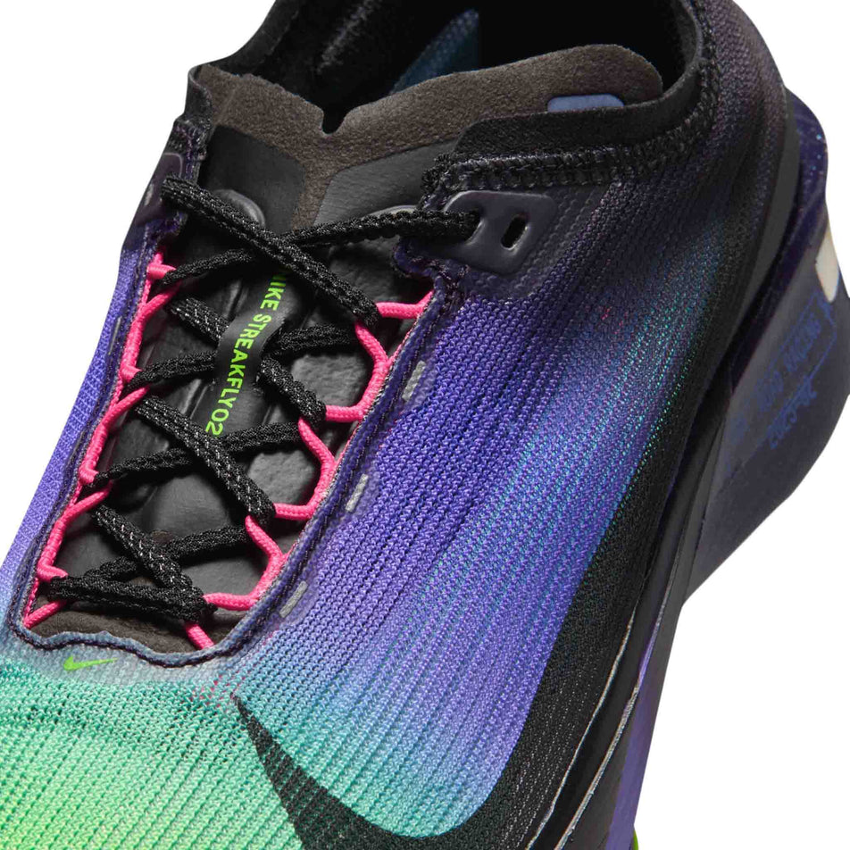 Close-up view of the upper of the left shoe from a pair of Nike Men's Streakfly 2 Glam Road Racing Shoes in the Dark Obsidian/Black-Electric Green colourway.