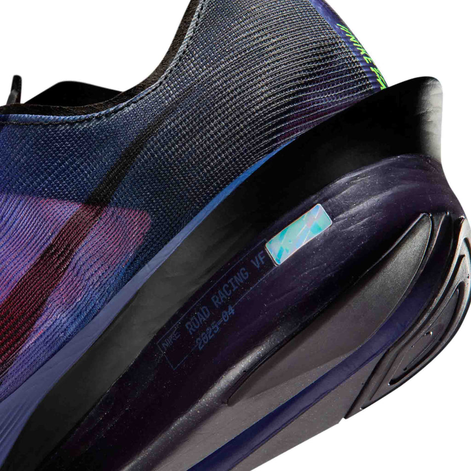 Close-up view of the rearfoot section of the left shoe from a pair of Nike Men's Vaporfly 4 Glam Road Racing Shoes in the Dark Obsidian/Black-Purple Dynasty colourway.