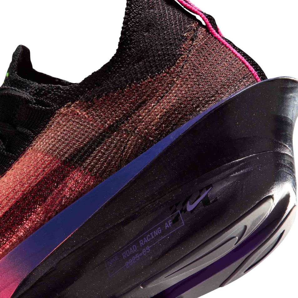 Close-up view of the rearfoot section of the left shoe from a pair of Nike Men's Alphafly 3 Road Racing Shoes in the Orange Pulse/Black-Purple Dynasty colourway.